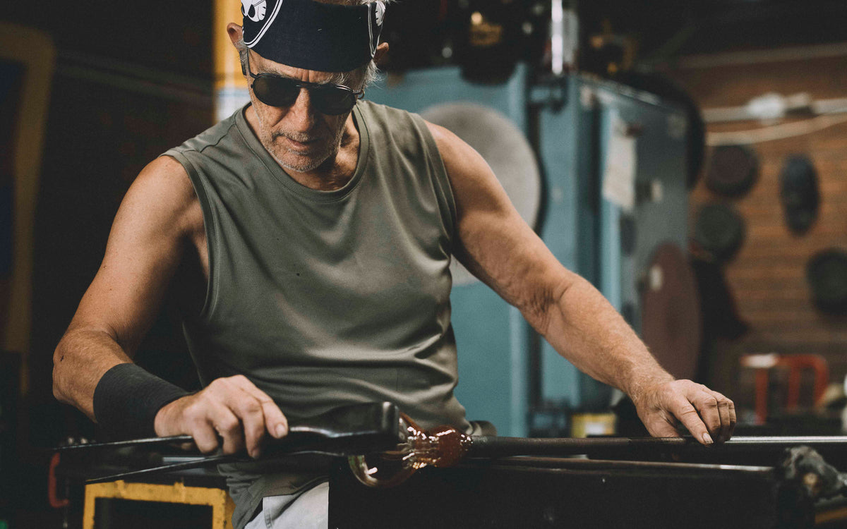 Keith Rowe manipulating molten glass